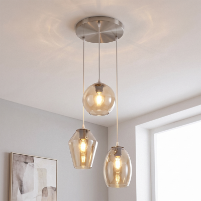 Ronde design hanglamp Lazaro met 3 amberkleurige kappen